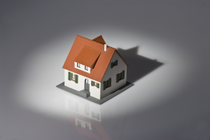 bigstockphoto_House_On_Spotlight_3256315